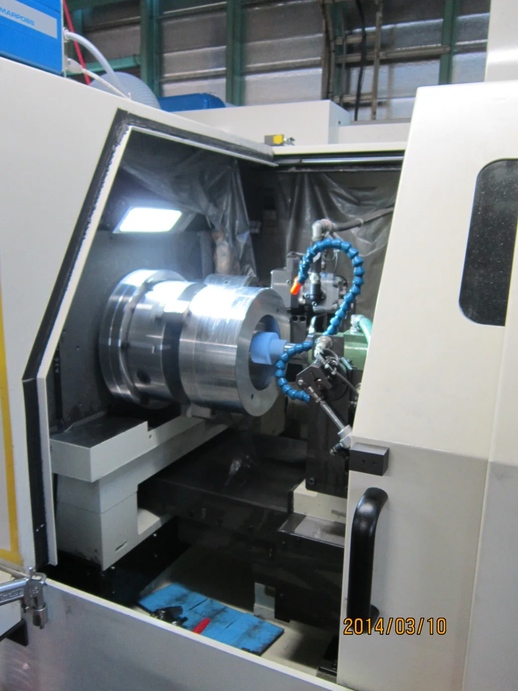 砥石クイル内製化と深穴・テーパの精密加工